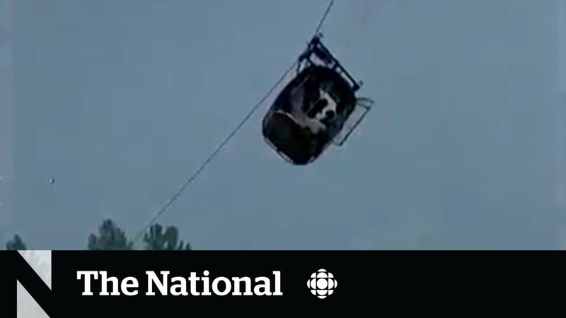8 rescued from dangling cable car in