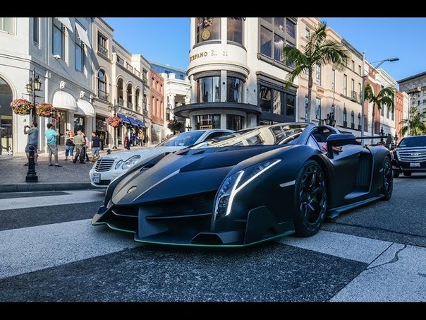 Lamborghini Veneno Roadster driving in Beverly